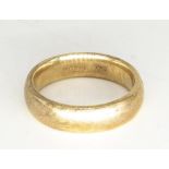 Late C20th hallmarked 9ct yellow gold wedding band by London, size P, 6.6g