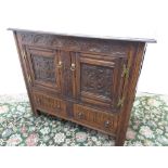 C18th style oak side cabinet, moulded top and lunette carved frieze above two doors and two arcade