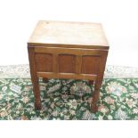 Robert Mouseman Thompson of Kilburn - an panelled oak sewing box, adzed hinged top with lift out