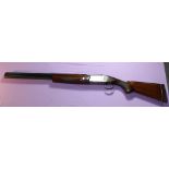Nikko 5000 12B over and under single trigger ejector shotgun, with 2 3/4 chambers, 26" barrels, 16