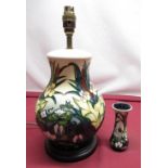 Moorcroft pottery baluster table lamp, decorated in Bullrush pattern on a cream ground, H36cm and