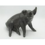 Patinated cast bronze model of a seated pig, L26cm H20cm