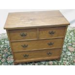 Alan Acornman Grainger of Brandsby - an oak chest of two short and three long drawers with brass