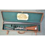 Cased vintage H Clarke & Sons of Leicester side by side double barrelled double trigger non