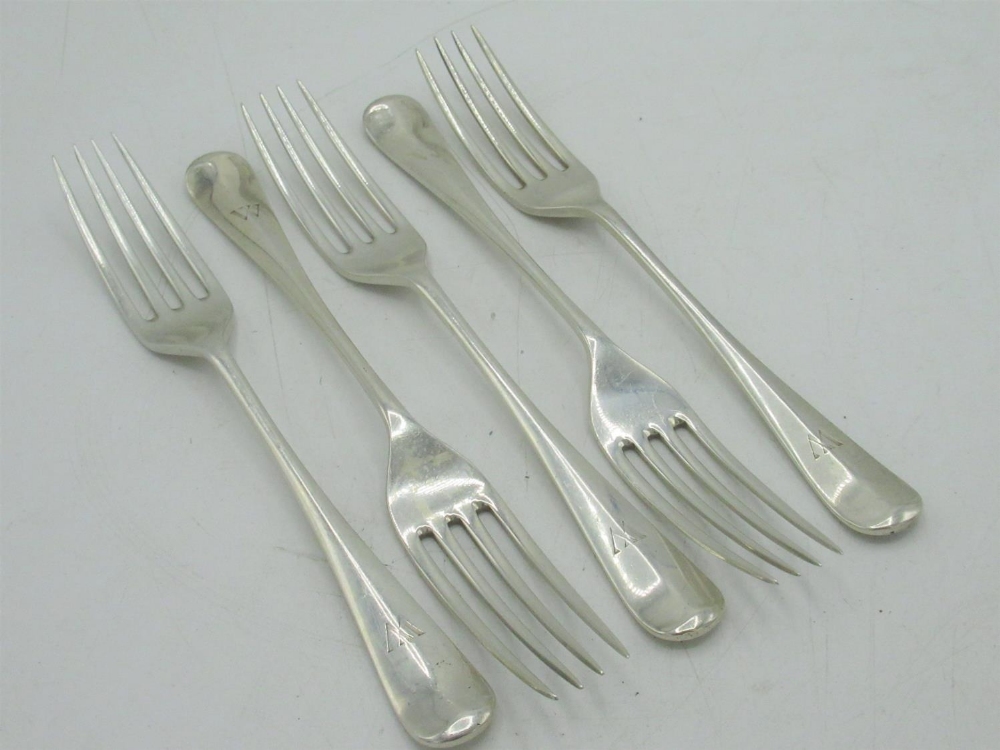 Set of five Geo.V hallmarked Sterling silver Old English Pattern dessert forks, initialled W, by