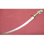 C19th naval type dirk, of Eastern style with 12 1/2" slightly curved blade, with brass grip and