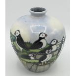 Moorcroft Pottery Puffin pattern vase, ovoid body decorated with Puffins in a coastal landscape,