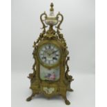 Late C19th French Rococo Revival cast gilt metal mantel clock, with painted porcelain Roman dial,