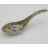 C19th Japanese Canton rice spoon, decorated in Famile enamels figures in reserve panel on a scrolled