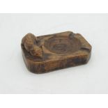 Robert Mouseman Thompson of Kilburn - an oak rectangular ash tray, carved with signature mouse,