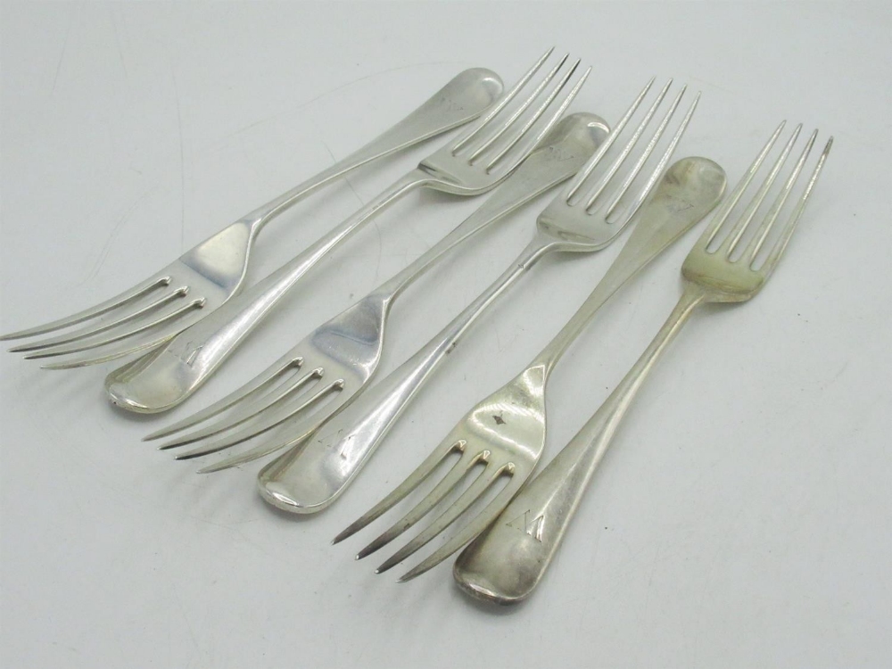 Set of six Geo.V hallmarked Sterling silver Old English pattern table forks initialled W, by