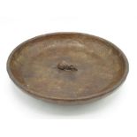 Robert Mouseman Thompson of Kilburn - a circular adzed oak fruit bowl, central relief carved