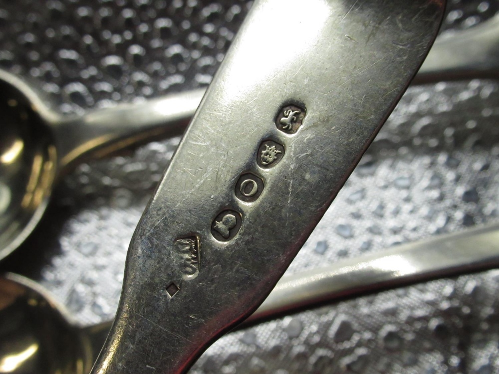 Set of four Geo.III hallmarked sterling silver Fiddle pattern dessert spoons, initialled, by - Image 2 of 2