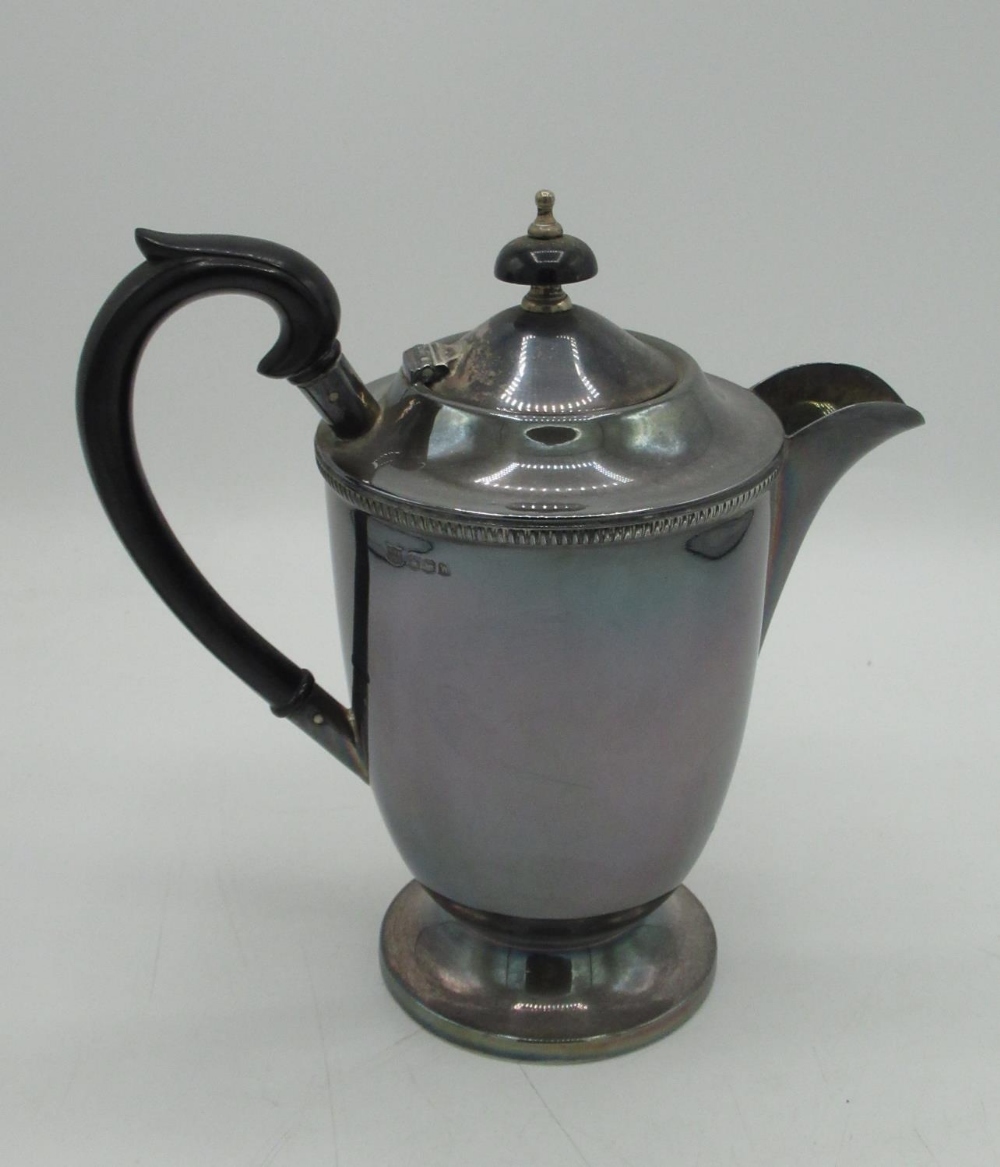 ERII hallmarked Sterling silver three piece tea service, teapot with ribbed rim, ebonised handle and - Image 2 of 5