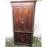Geo.III mahogany standing corner cupboard, moulded cornice above four ovolo panel doors with four