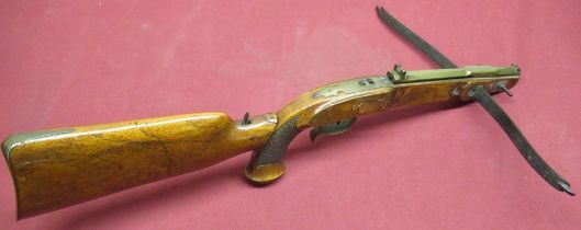 Early C19th German pistol crossbow, with 14" steel bow and brass mounts, octagonal brass "pistol"