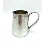 ERII hallmarked sterling silver circular tapering milk jug, makers marks WHB, Birmingham 1977, 8.
