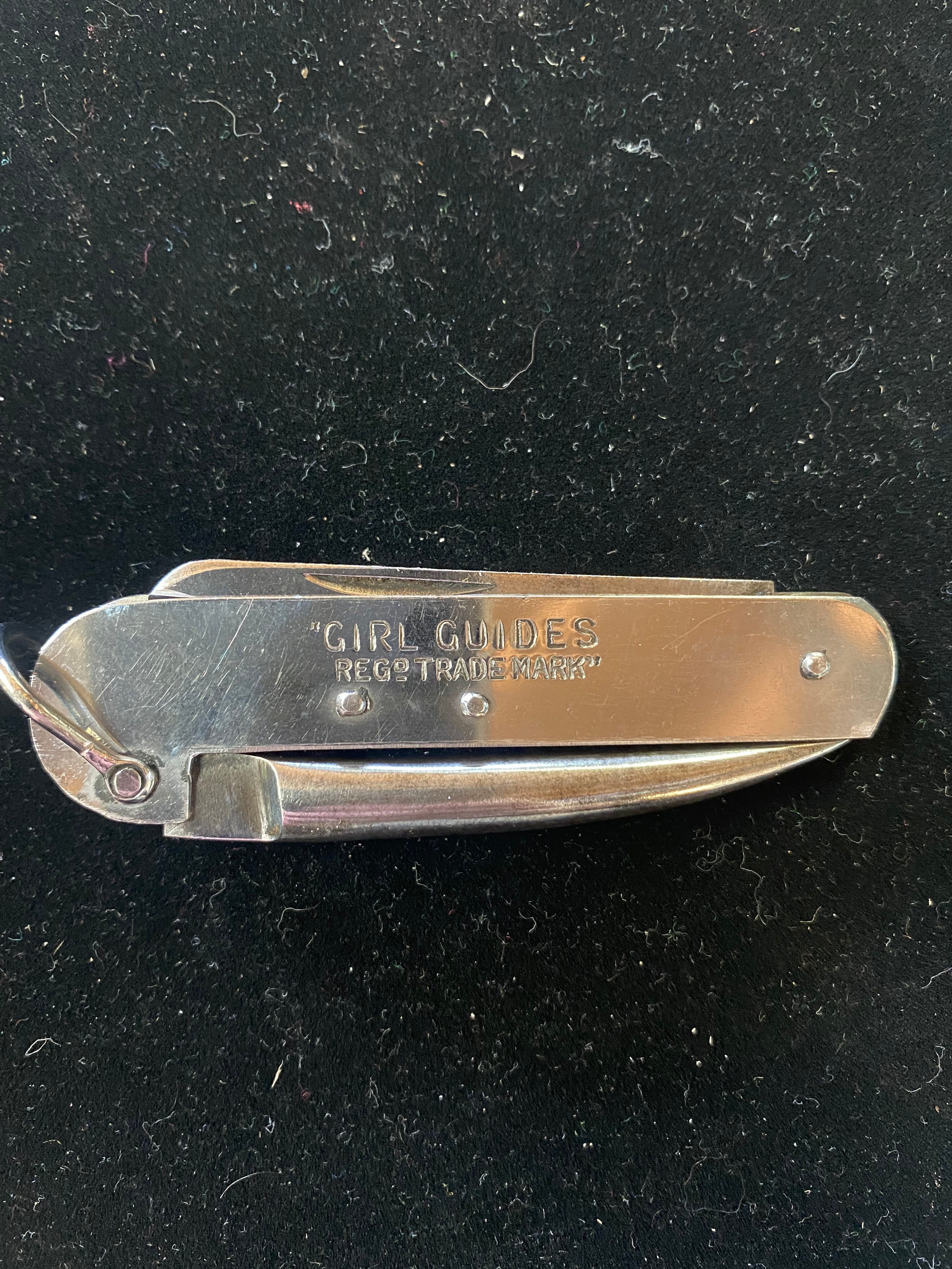 Girl Guides stainless steel pocket knife with single blade and marlin spike belt loop, blade