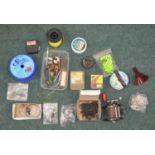 Collection of fishing equipment (mostly sea) including line, large hooks, lures, a random spool, a