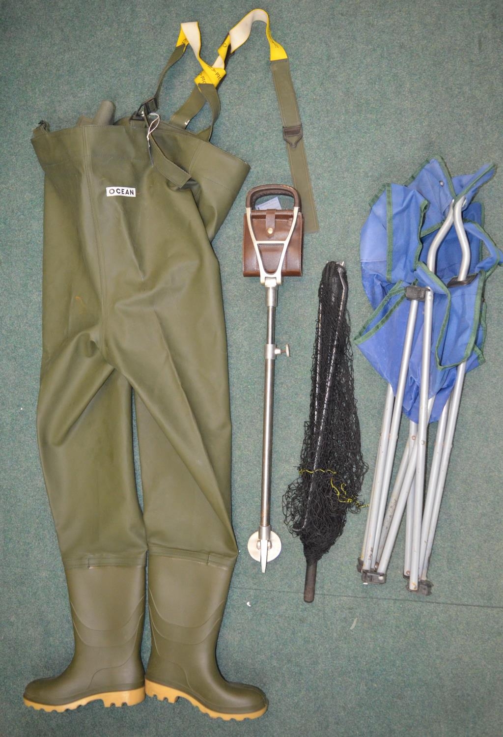 A walking/shooting stick, a pair of as new Ocean chest high waders with studded soles (UK size 7.5),