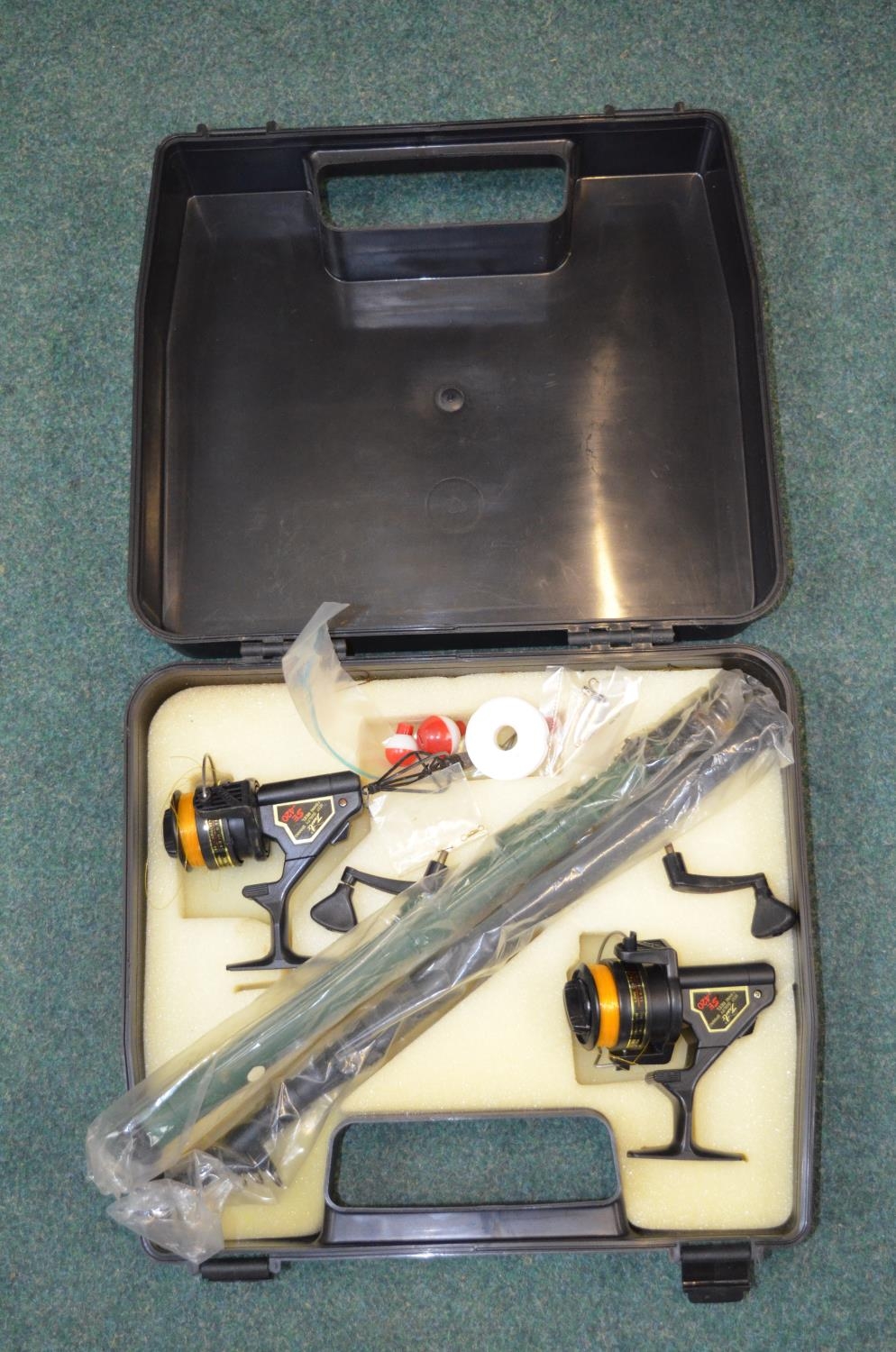 Boxed 2 set fishing/spinning set, 2 rods and reels and some accessories.