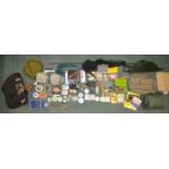 Large collection of fishing equipment, Fly and monofilament line, landing nets, an Isusu Charger