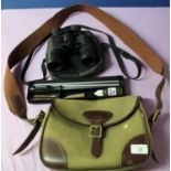 Leather and canvas cartridge bag with webbing shoulder strap, pair of Tasco binoculars in case