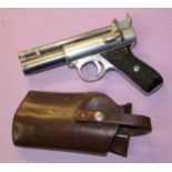 A Webley Premier .22 over lever action air pistol, in working order with leatherr holster. 763