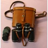 A pair of Japanese Tohyoh action tested 7x-15x35 binoculars with leather case.