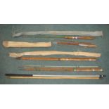Two landing net handles and four vintage fishing rods: A Milbro early fibreglass two piece general