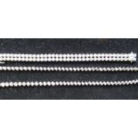C21st silver and diamond bracelet, two rows of diamonds inset in sterling silver circular mounts