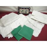 Set of eleven green napkins, cushion with slogan ?It ain?t Easy Being King?, large cream damask