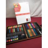 Cased artists set containing crayons, oil pastels, coloured pencils, fibre-tipped pens and four