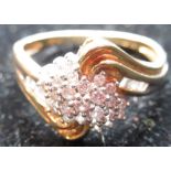 Hallmarked 9ct yellow gold diamond cluster ring, channel set emerald cut diamond shoulders, size