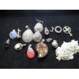 Collection of sterling silver chains 1.1ozt and a collection of sterling sliver mounted pendants (