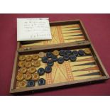 Early 20th Century folding travelling draughts board complete with draughts interior set with
