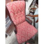Victorian mahogany framed upholstered nursing chair, on turned supports,