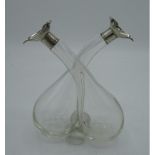 Edw.VII double neck oil and vinegar bottle with hallmarked Sterling silver hinged ball stoppers