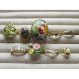 Millefiori costume ring and a collection of sterling silver rings, set with a variety of different