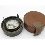 Early C20th small boat compass, in lacquered brass gimbled mount, with two hinged sighting markers