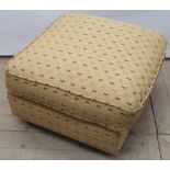 Modern upholstered square footstool on tapered feet