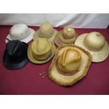 Late C20th pith helmet, three straw coolie-type hats, straw Stetson, straw summer hat and a