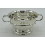 Geo.VI hallmarked sterling silver two handled cup on stepped circular base by Emile Viner,