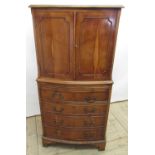 Small Geo.III style bowfront yew cocktail cabinet, with two doors and brushing slide above four long