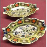 Pair of Royal Crown Derby Imari 1128 pattern trinket dishes, with lobed ends, (one repaired) W14cm