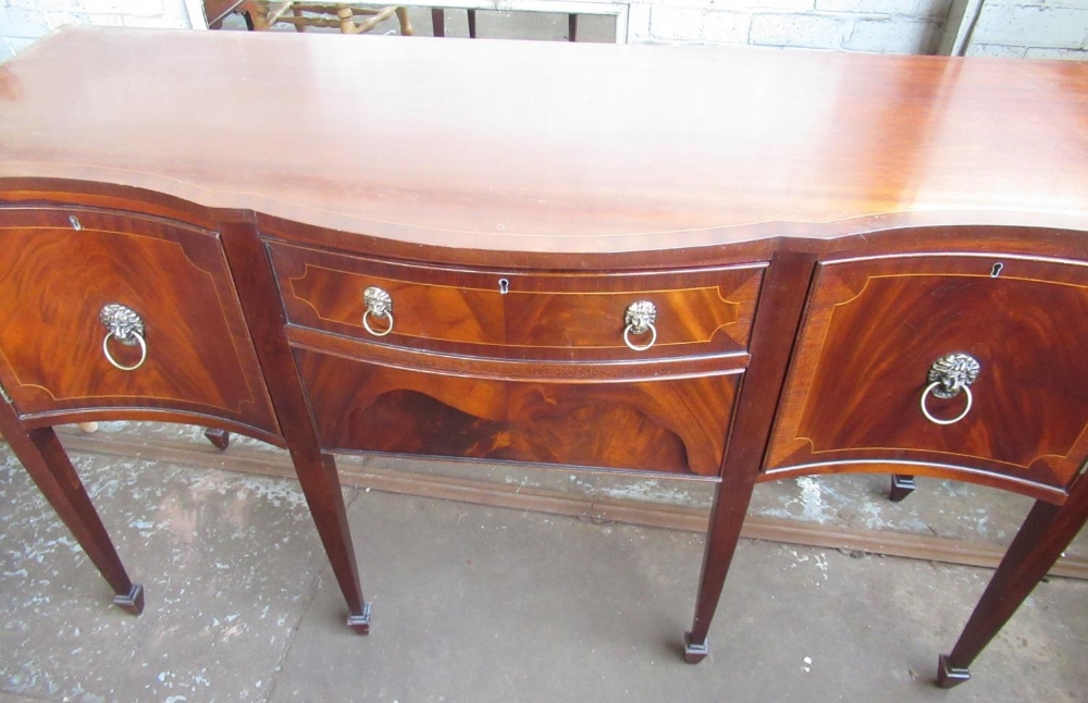 J Sydney Smith serpentine front mahogany sideboard, on square supports, W150cm D50cm H92cm