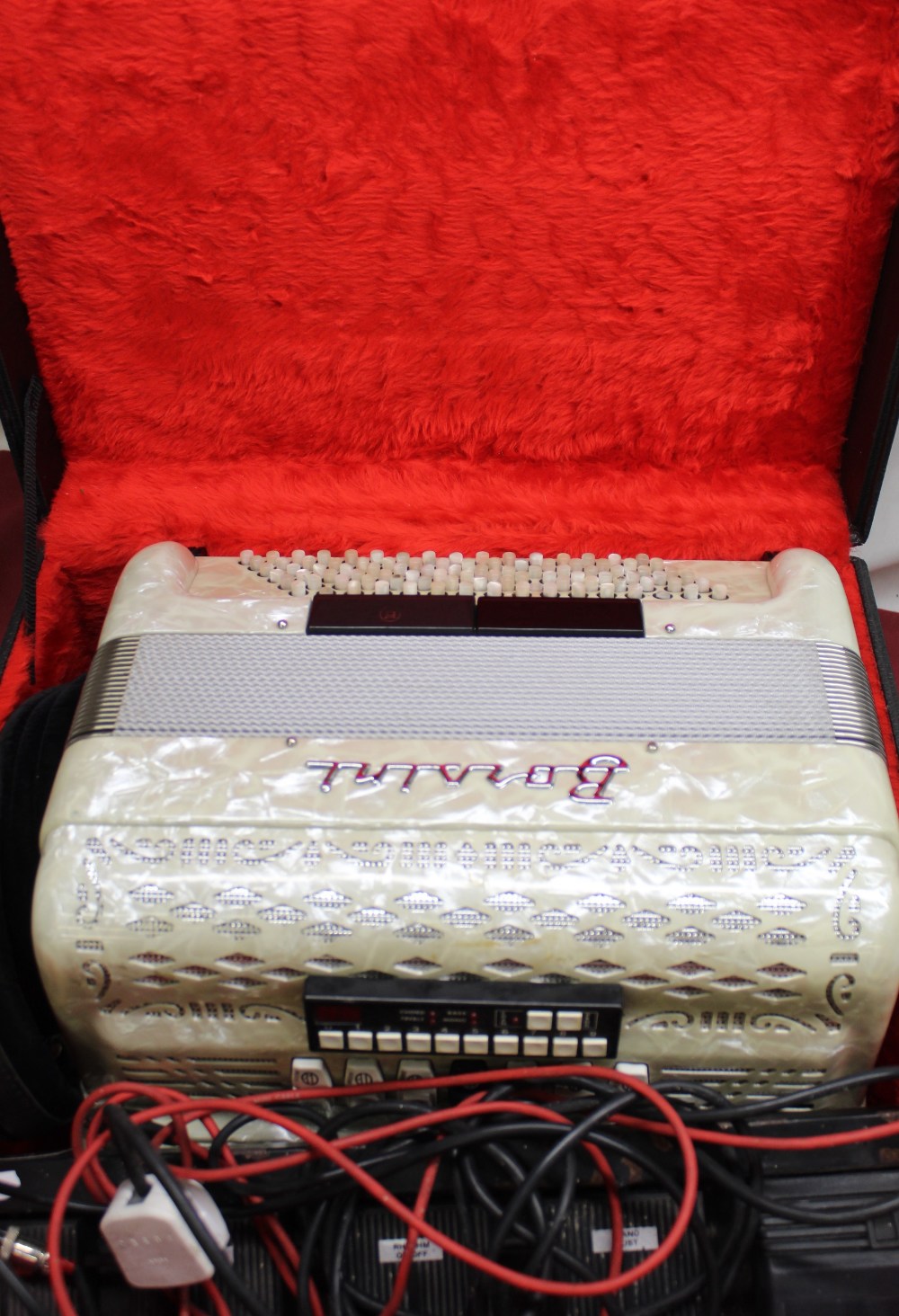 Early 1970's Borsini piano accordion in cream marbleised acrylic case, simulated black and white