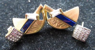 Pair of 15ct yellow gold earrings, central blue stone on textured semi-circular mounts with