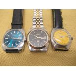 Citizen automatic wristwatch with date, turquoise fume dial with applied hour baton markers,