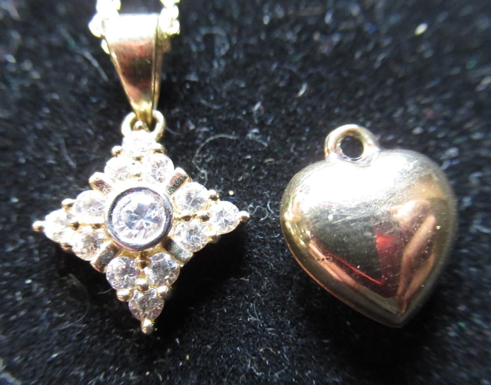 9ct yellow gold bright cut heart shaped locket, on a link chain necklace, another with an eye - Image 3 of 4